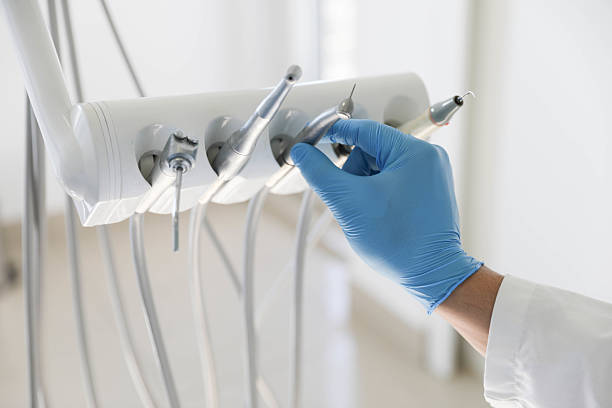 Professional Invisalign Clear Aligners technician working in Urbana, IA